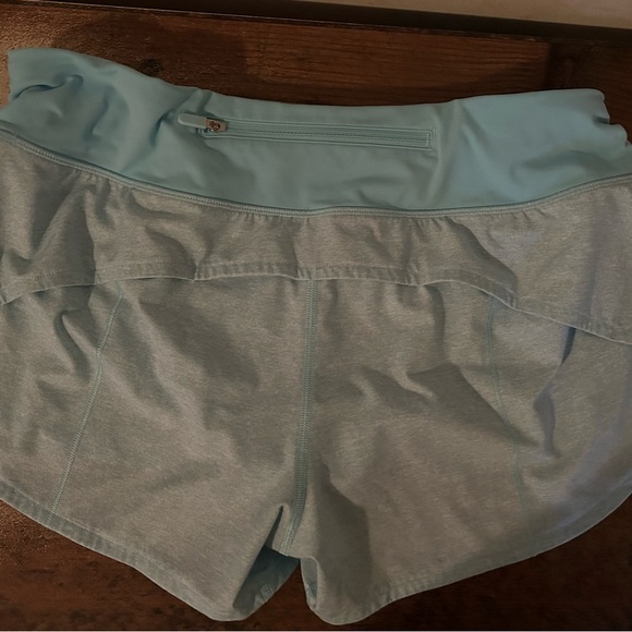 Lululemon speed up shorts in a frosty blue color. - Picture 5 of 7